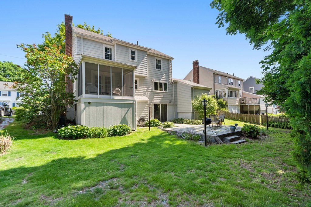 69 Statler Road Belmont, MA 02478 - Photo 28 of 34 a view of a house with a yard and sitting area