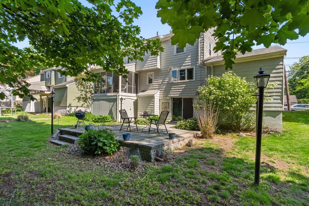 69 Statler Road Belmont, MA 02478 - Photo 29 of 34 a view of a house with backyard and sitting area