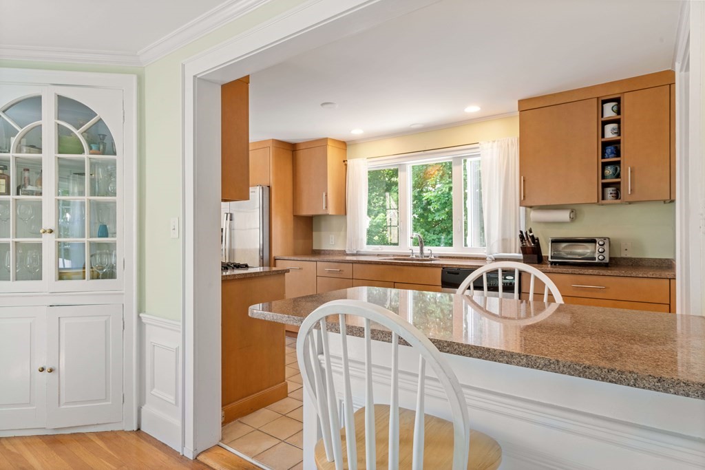 69 Statler Road Belmont, MA 02478 - Photo 9 of 34 a kitchen with a window a sink and a counter top space