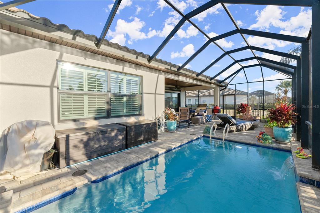 5 Rio Vista Drive Palm Coast, FL 32137 - Photo 24 of 74 a living room with furniture and a large window