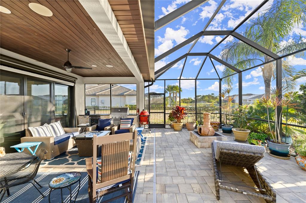 5 Rio Vista Drive Palm Coast, FL 32137 - Photo 25 of 74 a living room with patio furniture and a potted plants