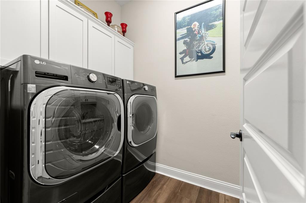 5 Rio Vista Drive Palm Coast, FL 32137 - Photo 49 of 74 a utility room with dryer and washer