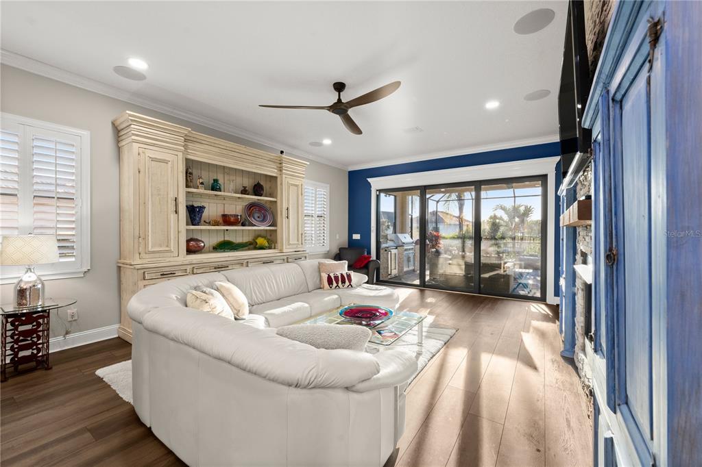 5 Rio Vista Drive Palm Coast, FL 32137 - Photo 8 of 74 a living room with furniture and a large window