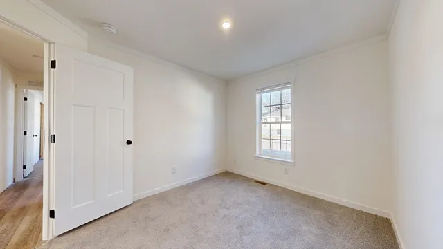 a view of an empty room with window