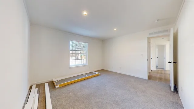 a front view of a house with a yard garage and outdoor space