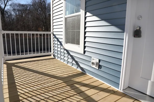 front view of a house with large windows