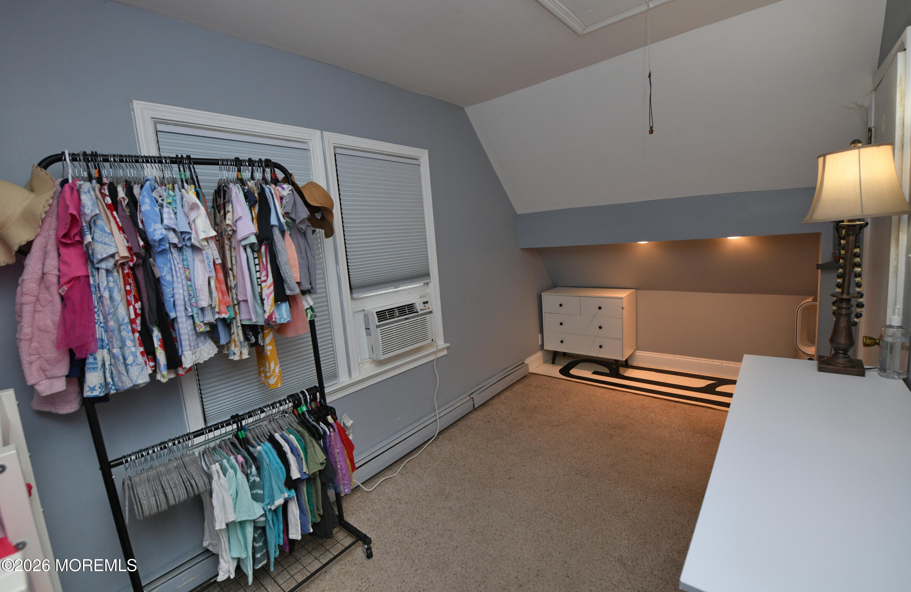 232 Pearce Avenue Point Pleasant, NJ 08742 - Photo 17 of 27 a view of walk in closet with clothes and shoes