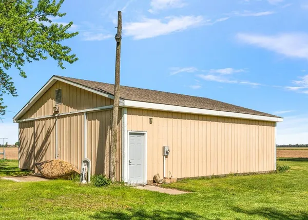 a view of a lake with a garden
