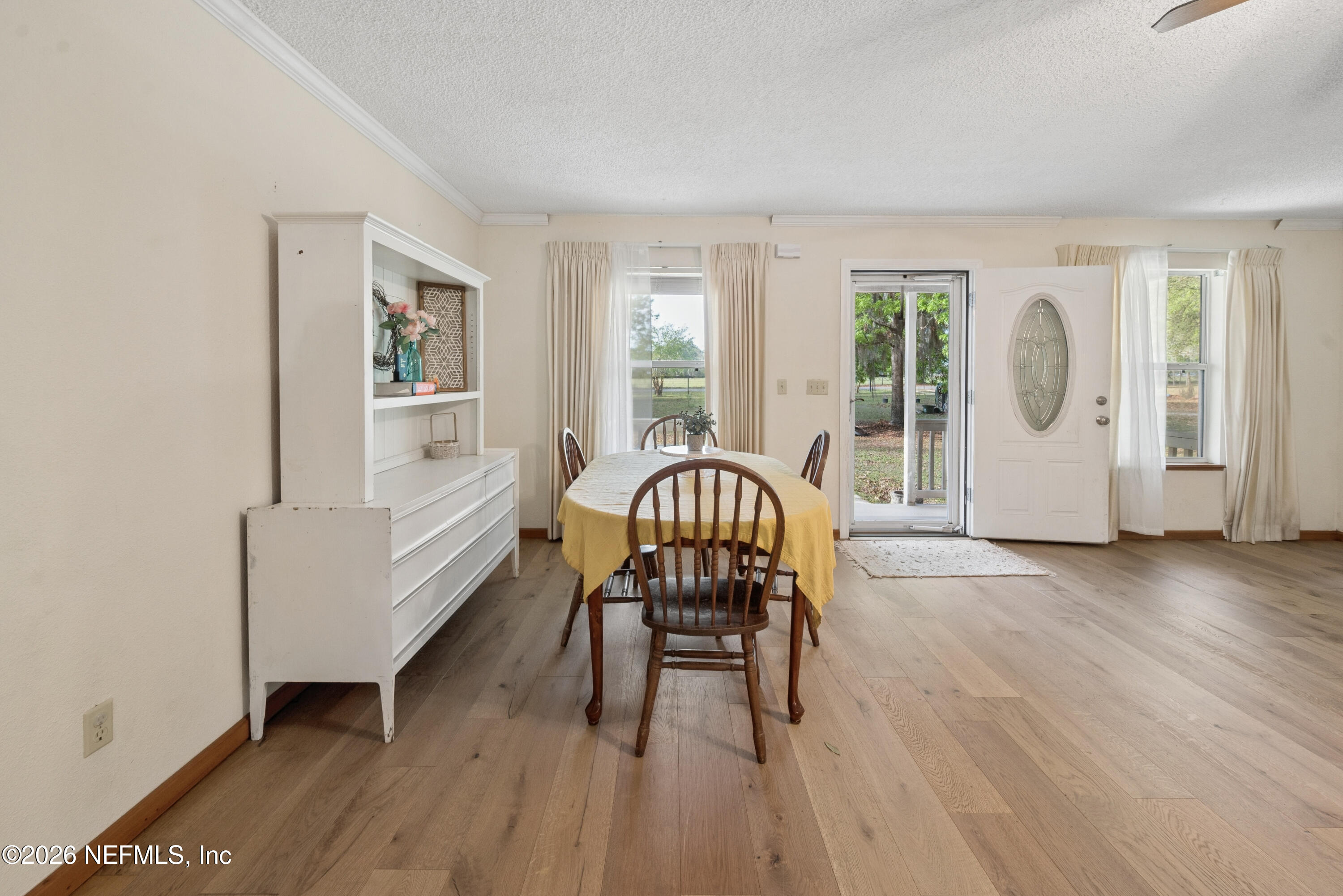 20021 Southeast 88th Trail Lake Butler, FL 32054 - Photo 18 of 43 a living room with furniture and a window