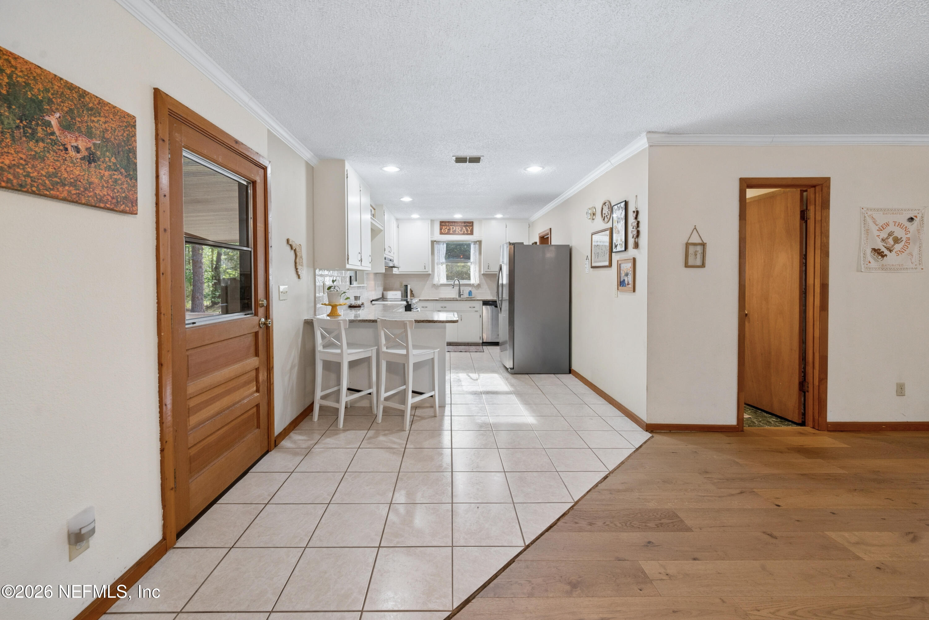 20021 Southeast 88th Trail Lake Butler, FL 32054 - Photo 24 of 43 a view of kitchen with furniture and refrigerator