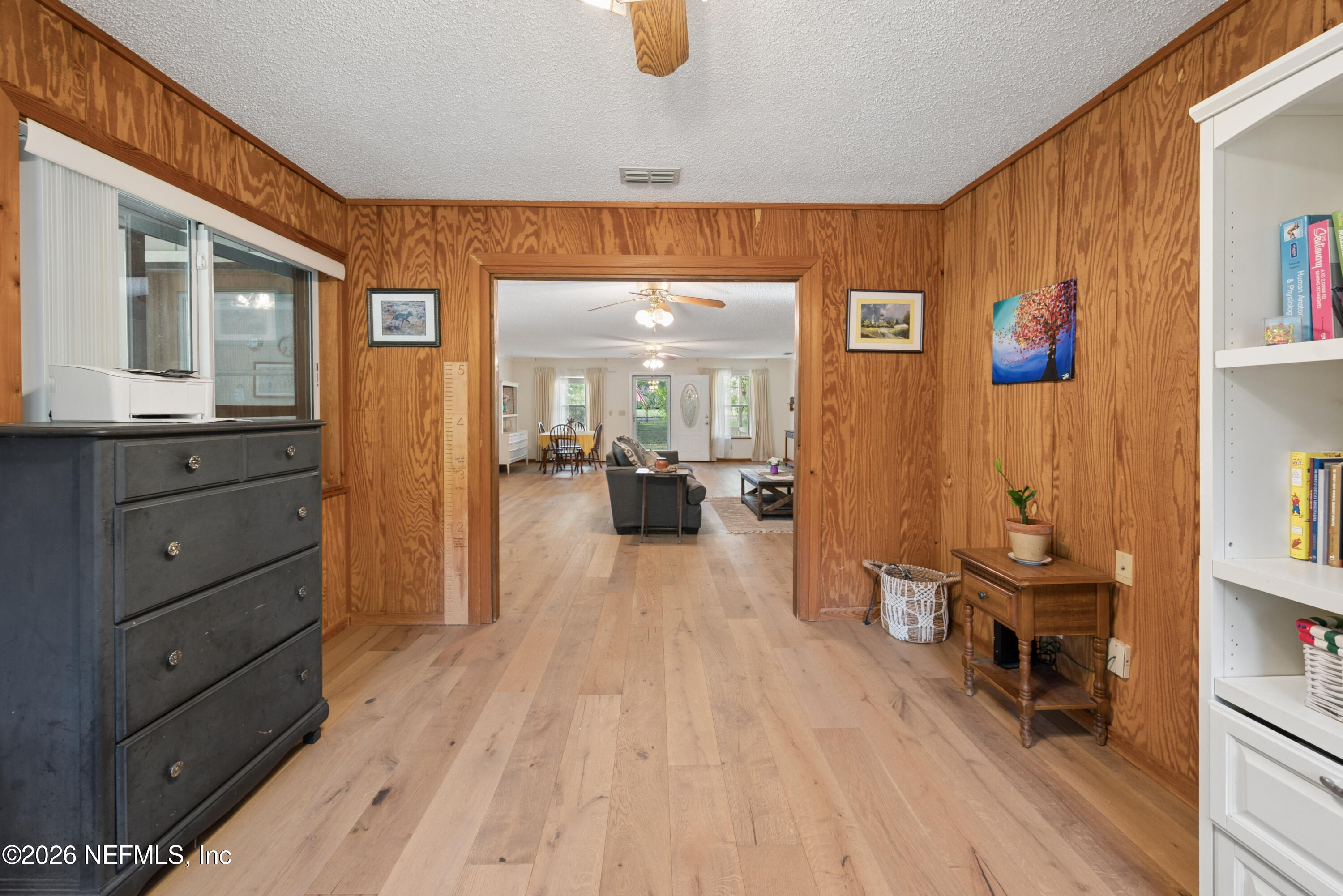 20021 Southeast 88th Trail Lake Butler, FL 32054 - Photo 31 of 43 a view of a living room kitchen and a wooden floor