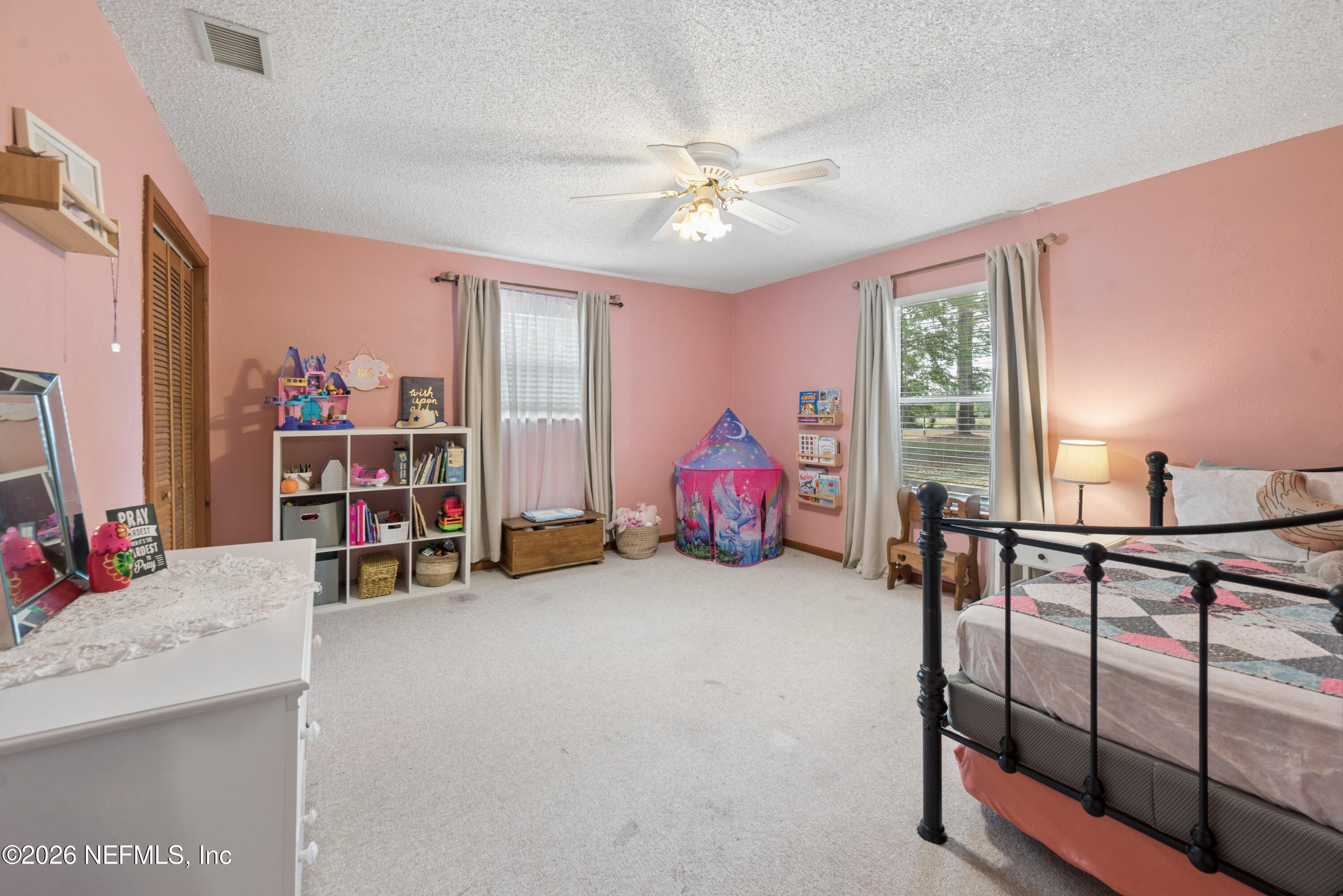 20021 Southeast 88th Trail Lake Butler, FL 32054 - Photo 37 of 43 a living room with furniture and a chandelier