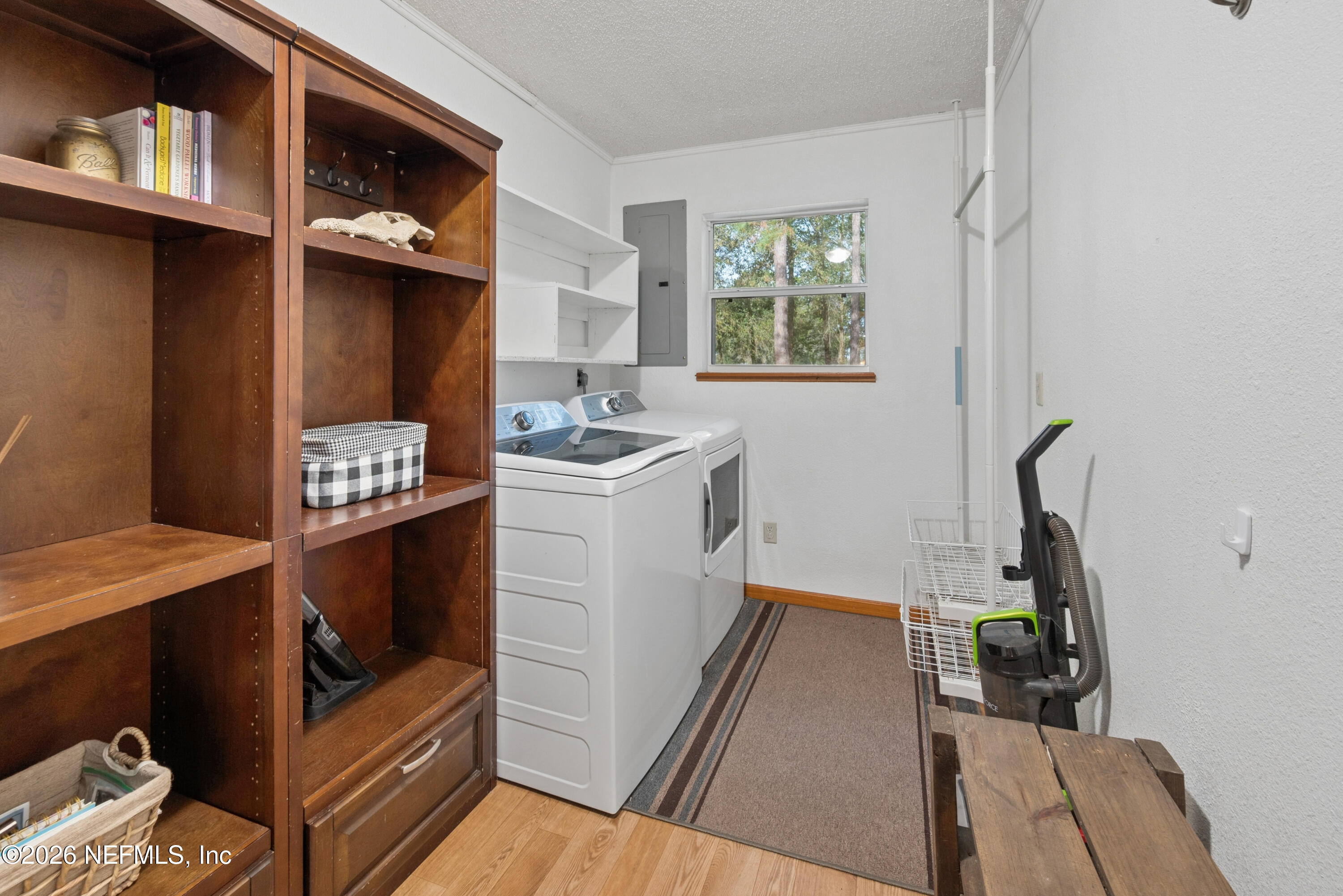 20021 Southeast 88th Trail Lake Butler, FL 32054 - Photo 41 of 43 a view of a kitchen with fridge and workspace