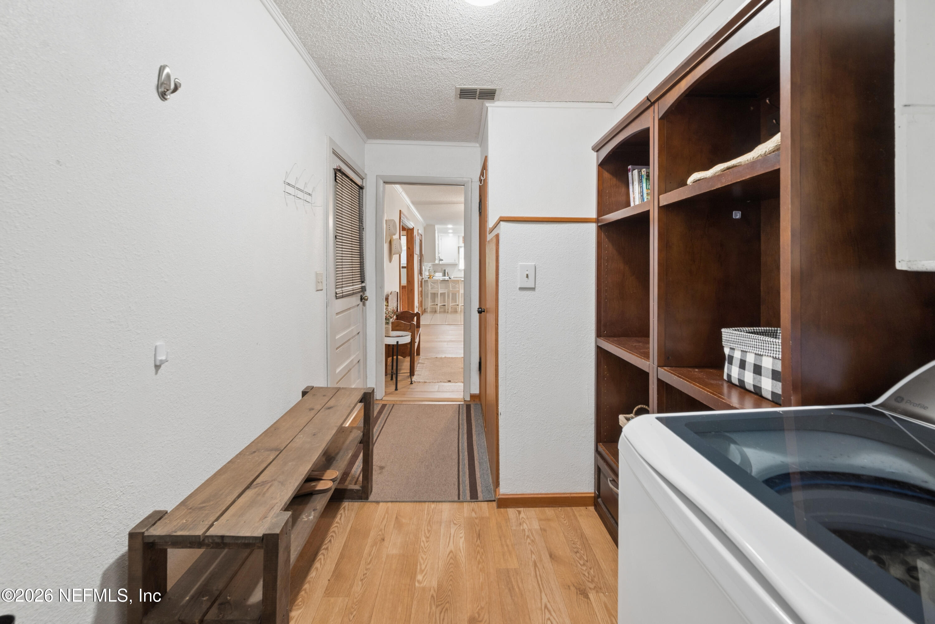 20021 Southeast 88th Trail Lake Butler, FL 32054 - Photo 42 of 43 a kitchen with a refrigerator and a sink