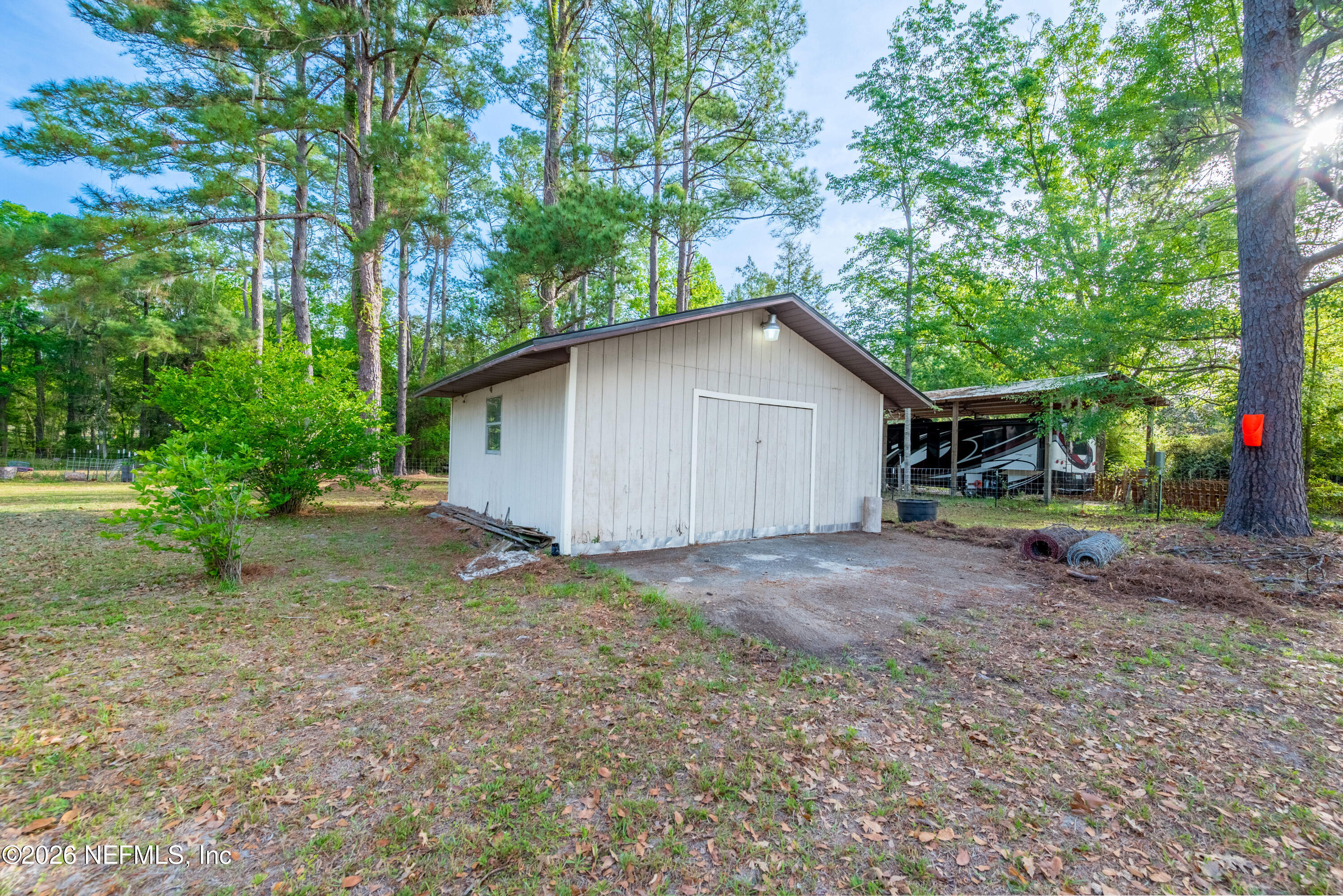 20021 Southeast 88th Trail Lake Butler, FL 32054 - Photo 7 of 43 a view of a house with backyard and garden