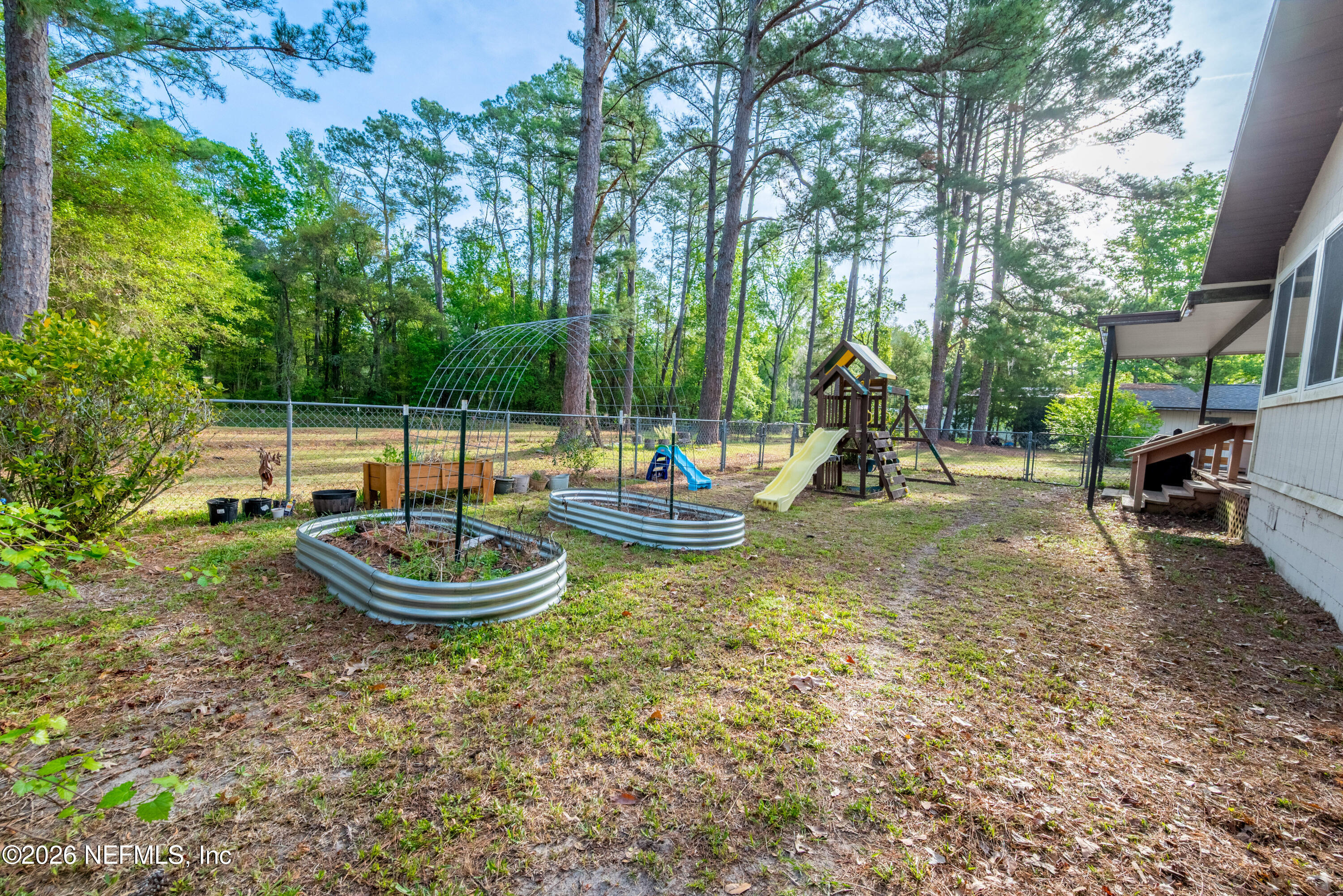 20021 Southeast 88th Trail Lake Butler, FL 32054 - Photo 9 of 43 a view of a park with swings