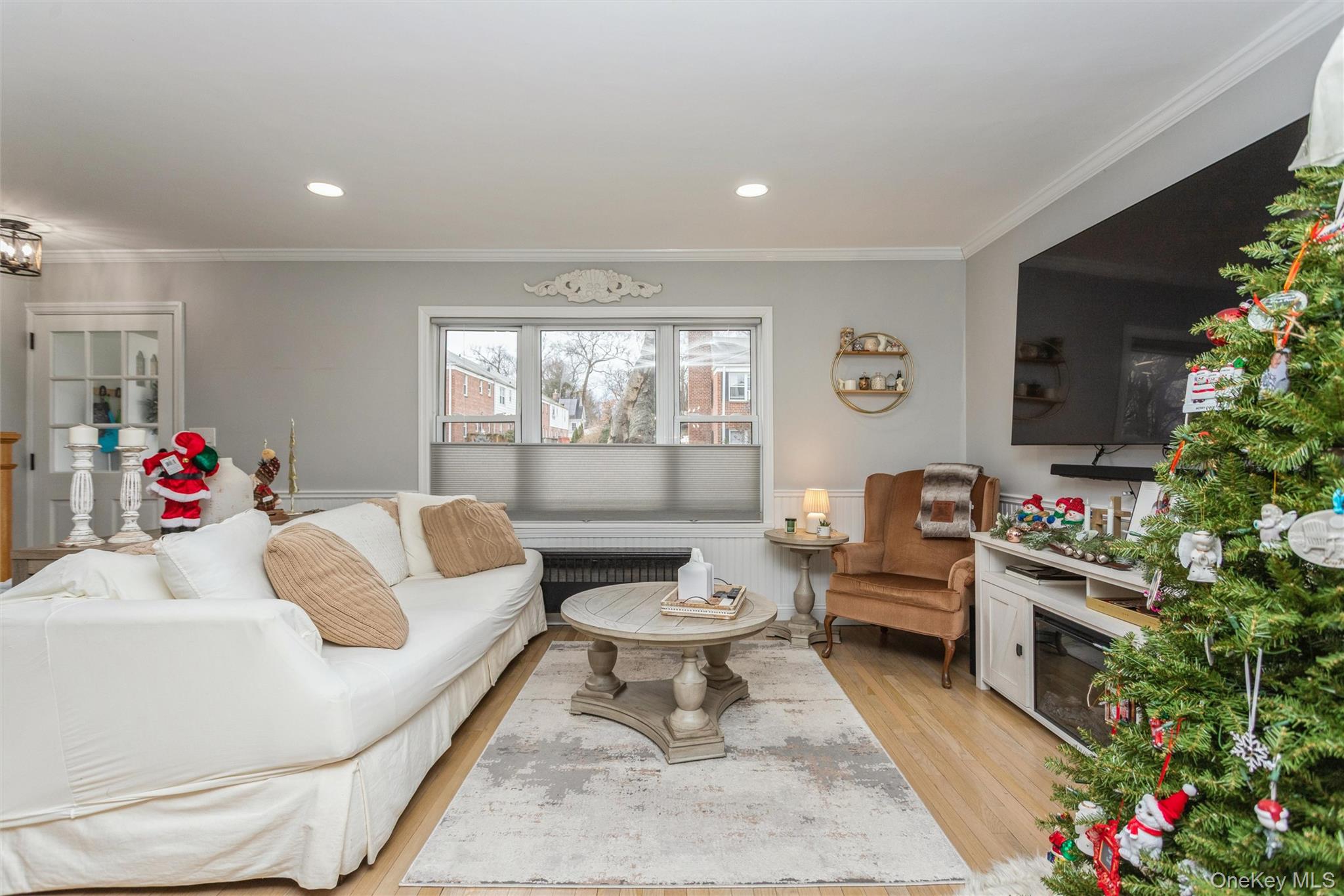5 Peck Avenue, Unit 51B Rye, NY 10580 - Photo 16 of 31 a living room with furniture and a potted plant