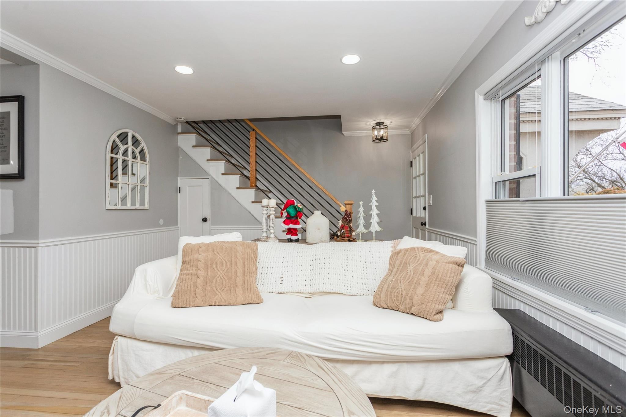 5 Peck Avenue, Unit 51B Rye, NY 10580 - Photo 5 of 31 a bedroom with furniture and a couch