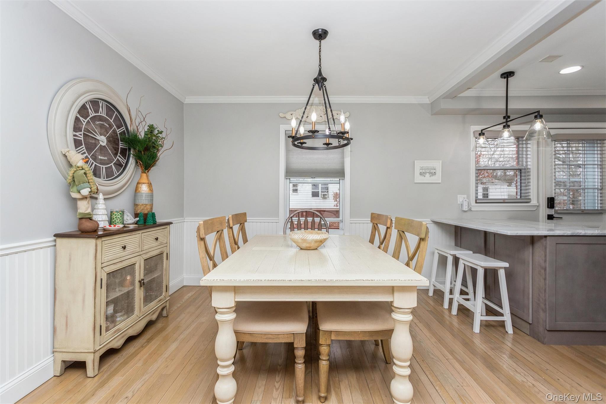 5 Peck Avenue, Unit 51B Rye, NY 10580 - Photo 7 of 31 a view of a dining room with furniture and wooden floor