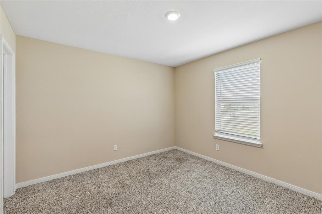230 Enchanted Way Princeton, TX 75407 - Photo 15 of 31 an empty room with a window