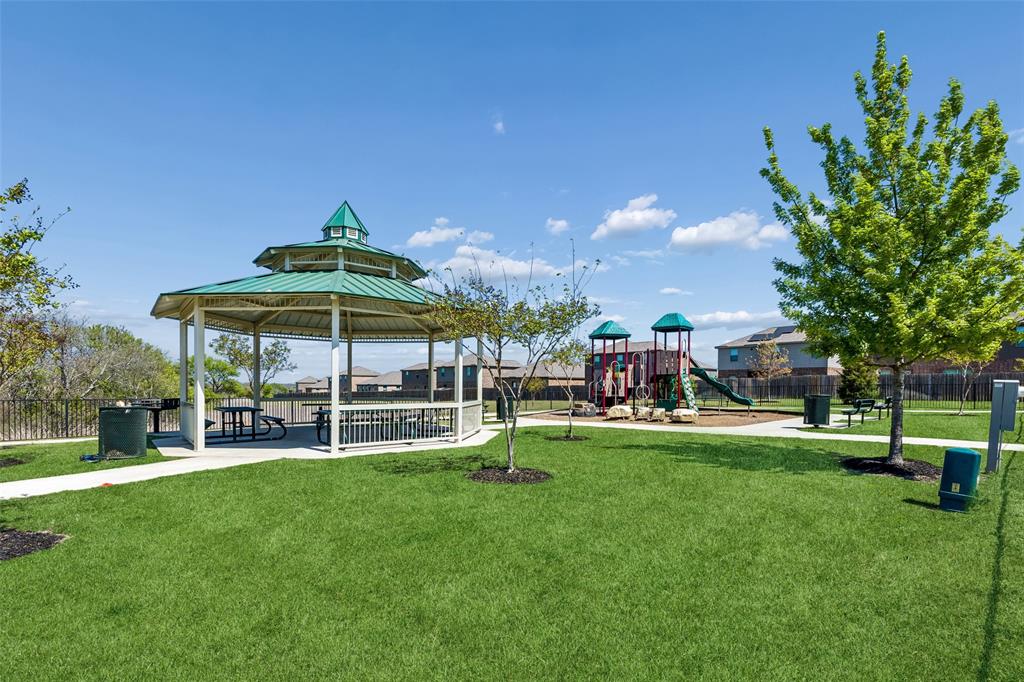 230 Enchanted Way Princeton, TX 75407 - Photo 27 of 31 a view of a house with a park