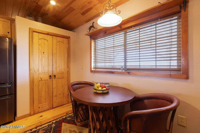 a spacious bathroom with a double vanity sink and a mirror