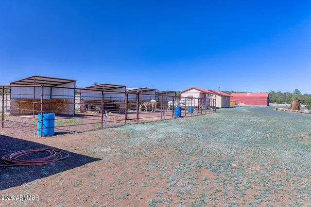 a view of a balcony with furniture