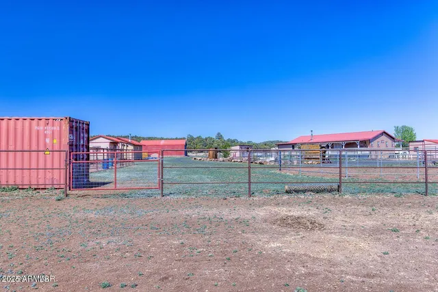 an aerial view of a house with outdoor space