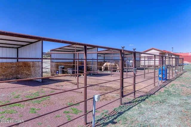 a view of a balcony with furniture
