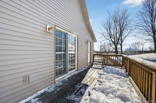 a view of a pathway with a balcony