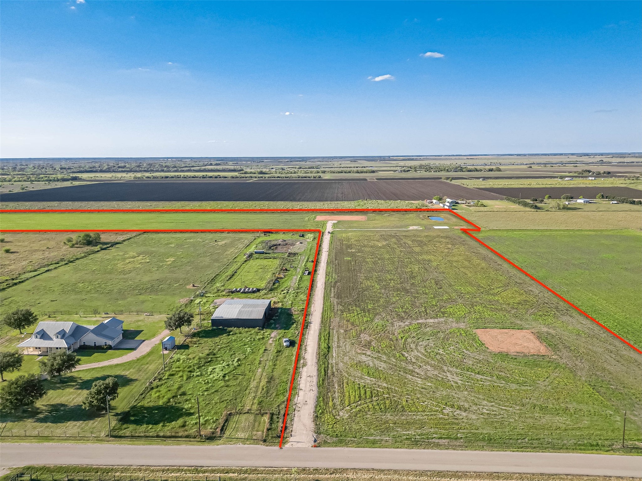 12424 McFarlane Road Beasley, TX 77417 - Photo 1 of 10 a view of a swimming pool and an outdoor space