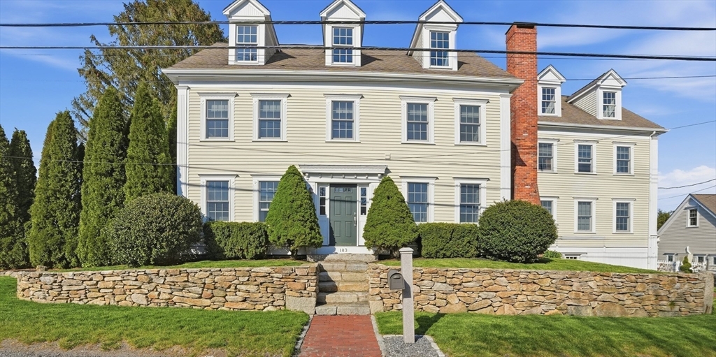 183 Whiting Street Hanover, MA 02339 - Photo 1 of 42 a front view of a house with garden