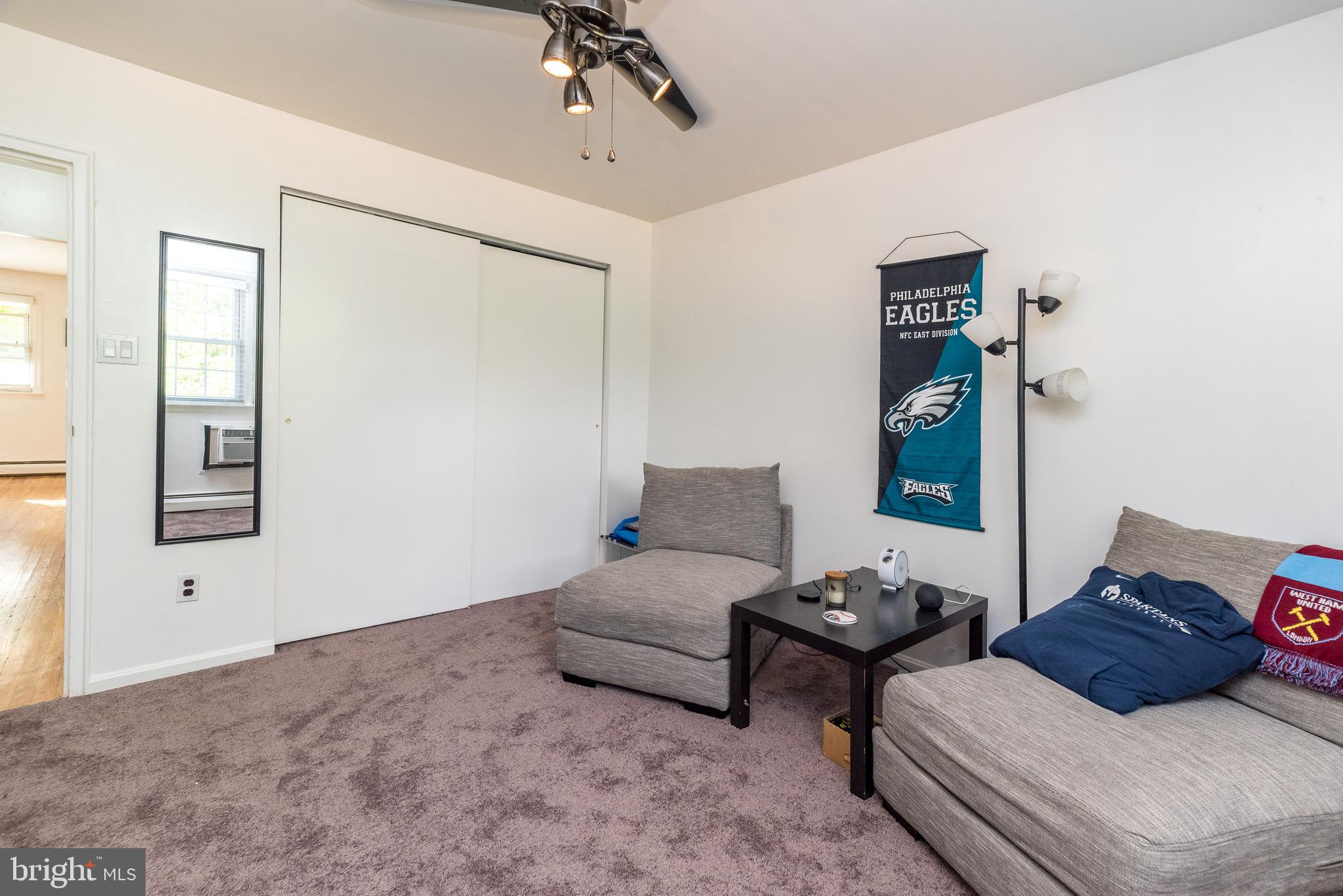 403 South Main Street, Unit C202 Doylestown, PA 18901 - Photo 15 of 18 a living room with furniture