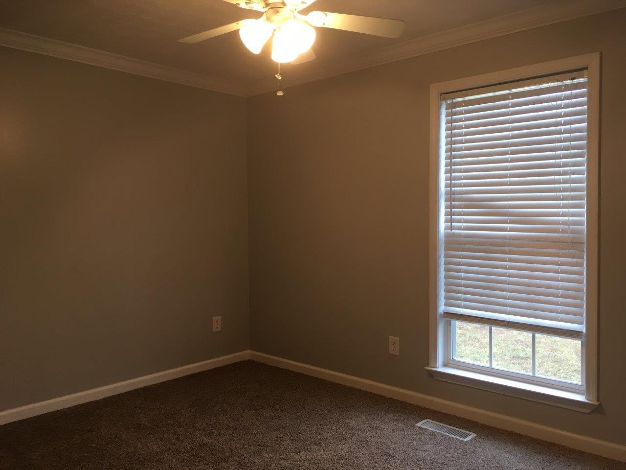 1009 Cameron Way Portland, TN 37148 - Photo 12 of 17 an empty room with a window
