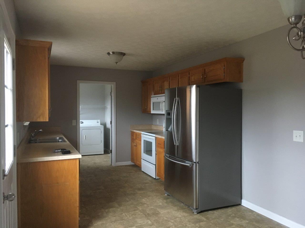 1009 Cameron Way Portland, TN 37148 - Photo 14 of 17 a kitchen with refrigerator and stove