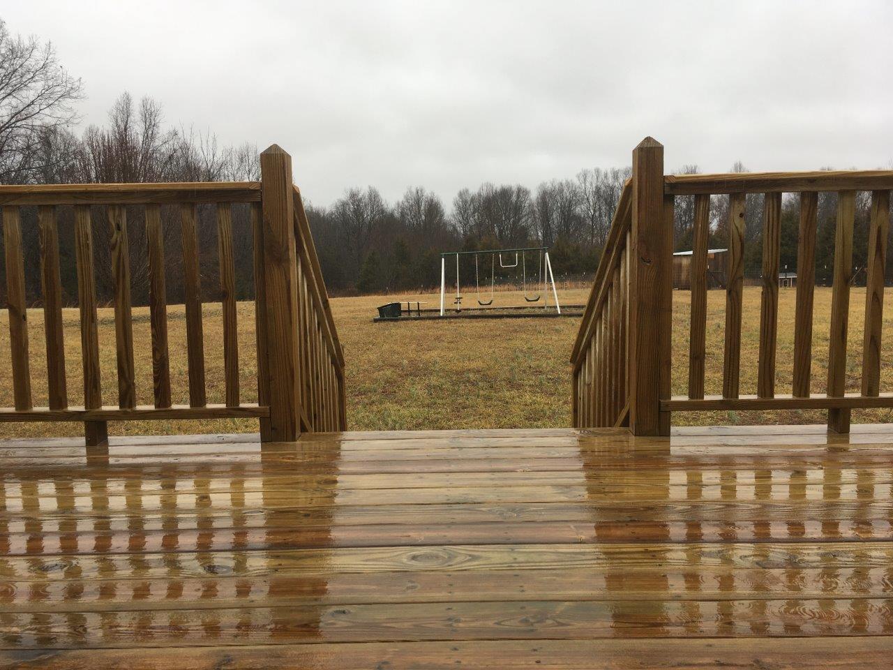 1009 Cameron Way Portland, TN 37148 - Photo 16 of 17 a view of deck with wooden floor and fence