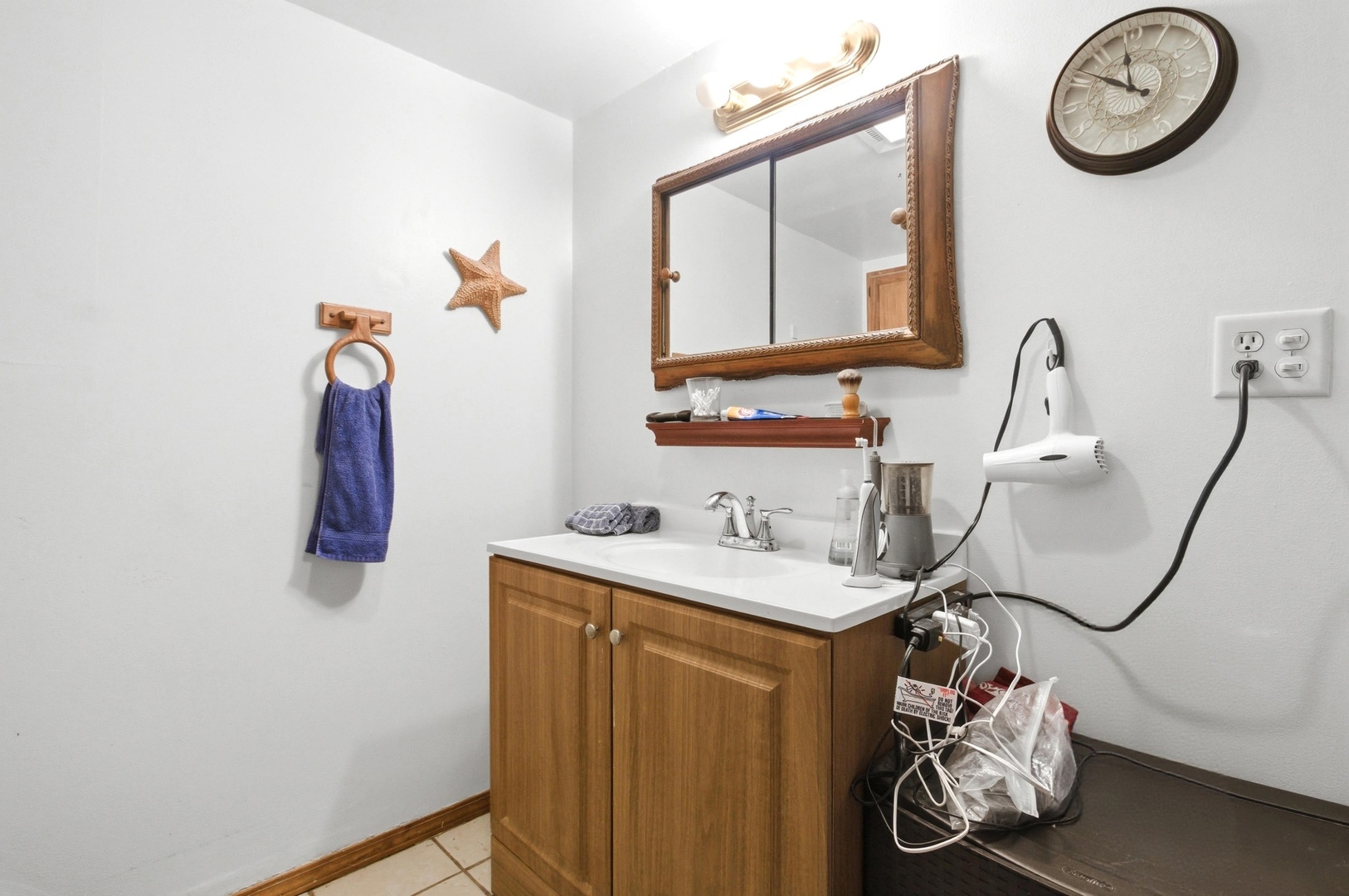 154 East Bailey Road, Unit D Naperville, IL 60565 - Photo 15 of 20 a bathroom with a sink and a mirror