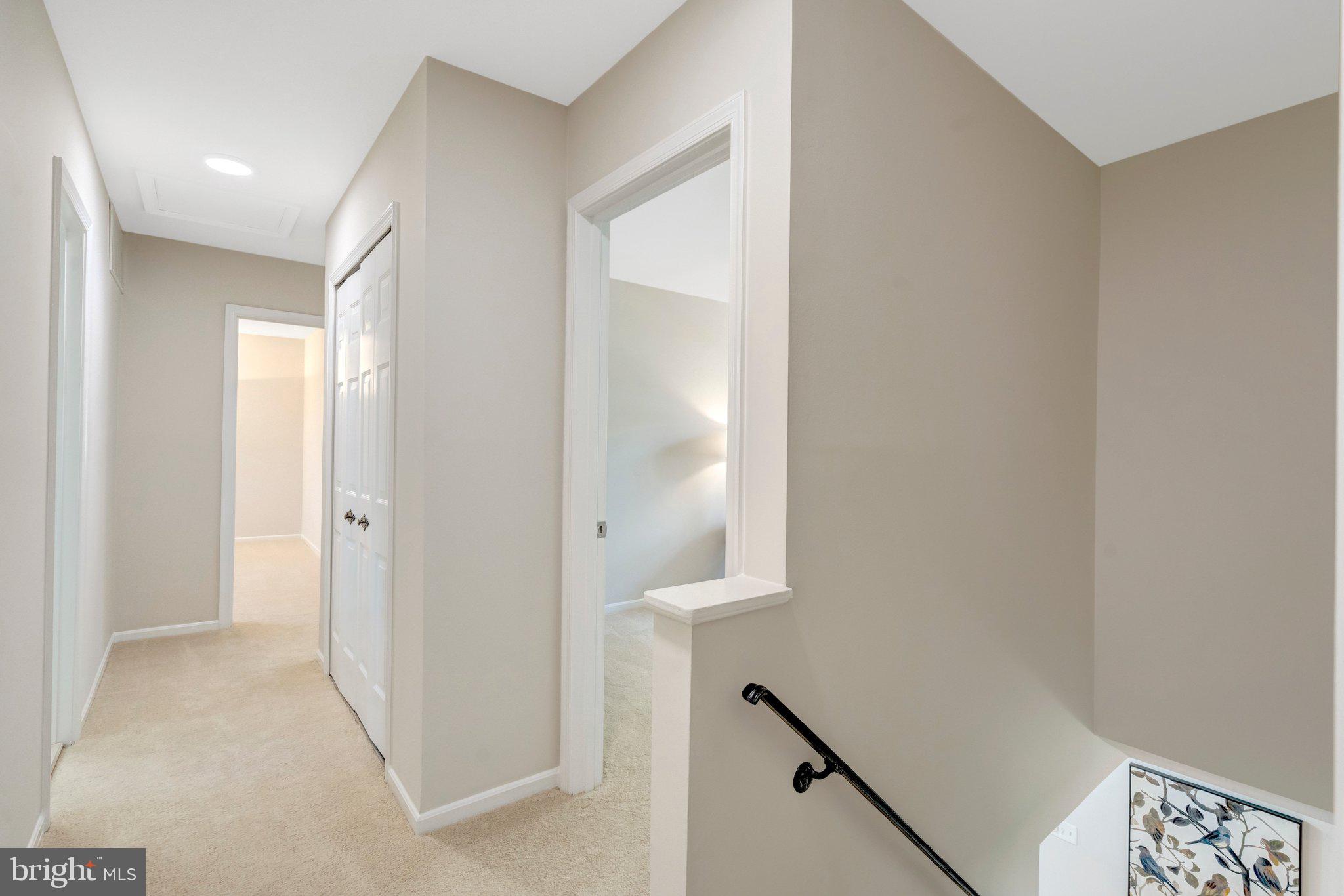 9010 Brook Ford Road Burke, VA 22015 - Photo 15 of 46 Brand new carpet on upper lvl & new hall lighting!