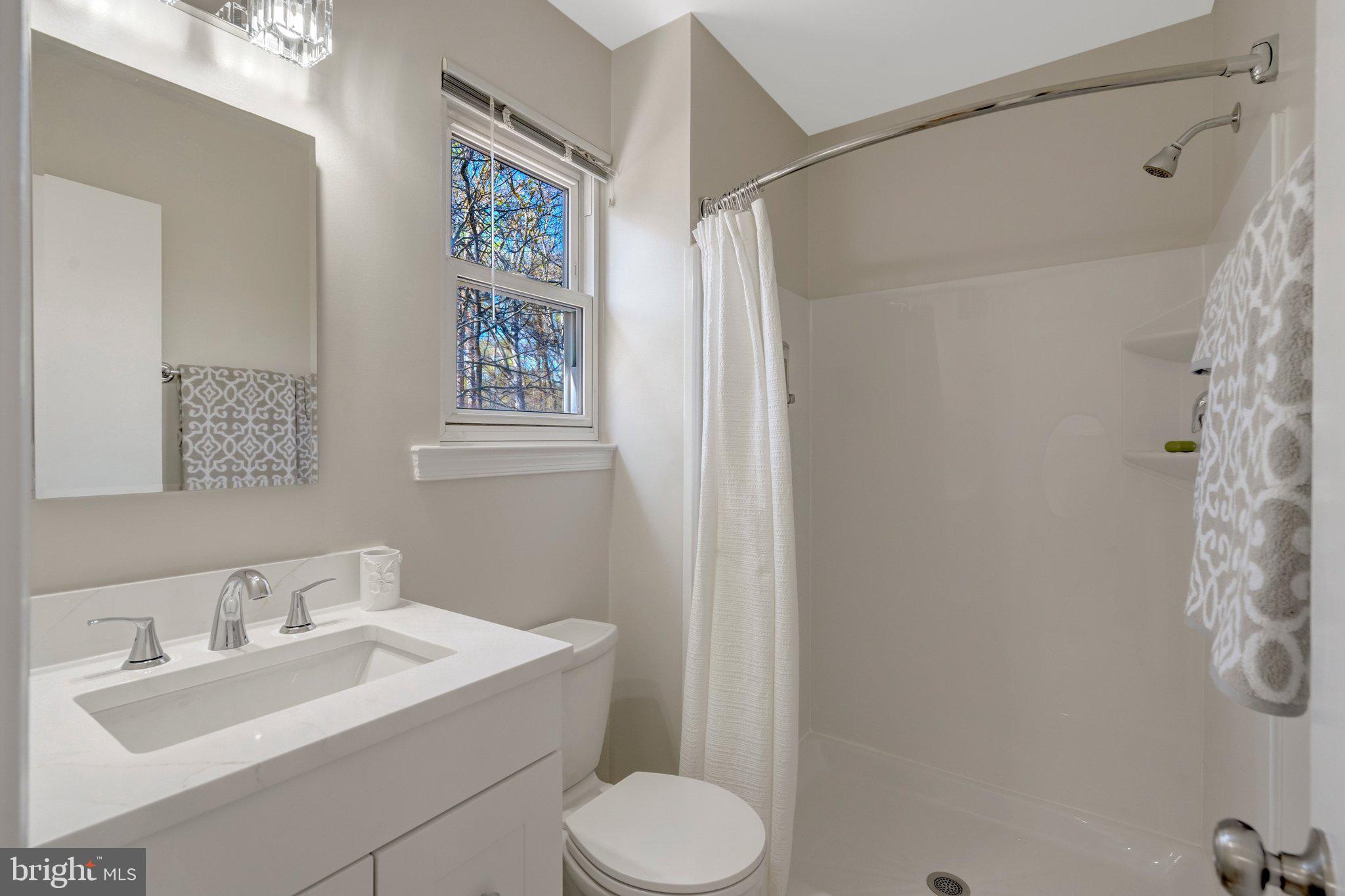 9010 Brook Ford Road Burke, VA 22015 - Photo 28 of 46 Primary BA w/ new vanity, counter, faucet, mirror!