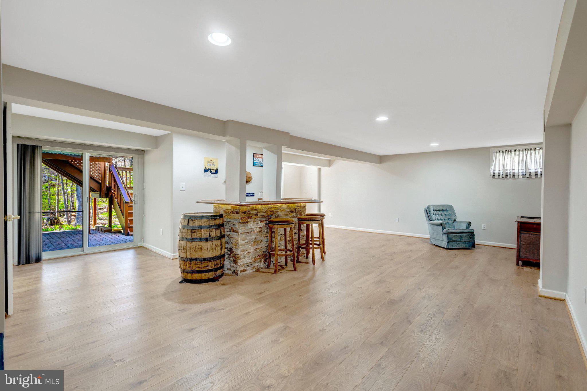 9010 Brook Ford Road Burke, VA 22015 - Photo 31 of 46 Huuuge lower level rec room walks out to backyard!