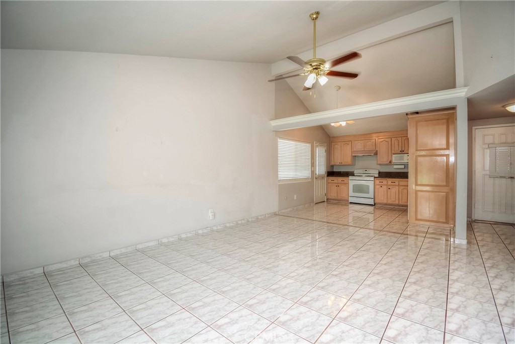 3446 Briarvale Street Corona, CA 92879 - Photo 14 of 37 a view of empty room with wooden floor and fireplace