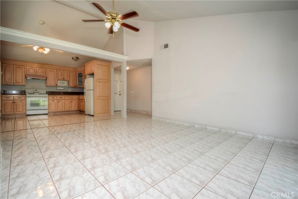 3446 Briarvale Street Corona, CA 92879 - Photo 15 of 37 a view of a kitchen with a sink and cabinets