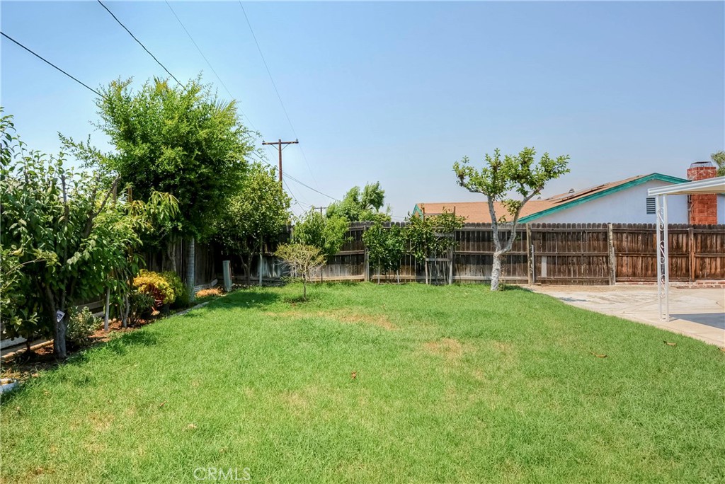 3446 Briarvale Street Corona, CA 92879 - Photo 32 of 37 a view of a house with a yard and sitting area