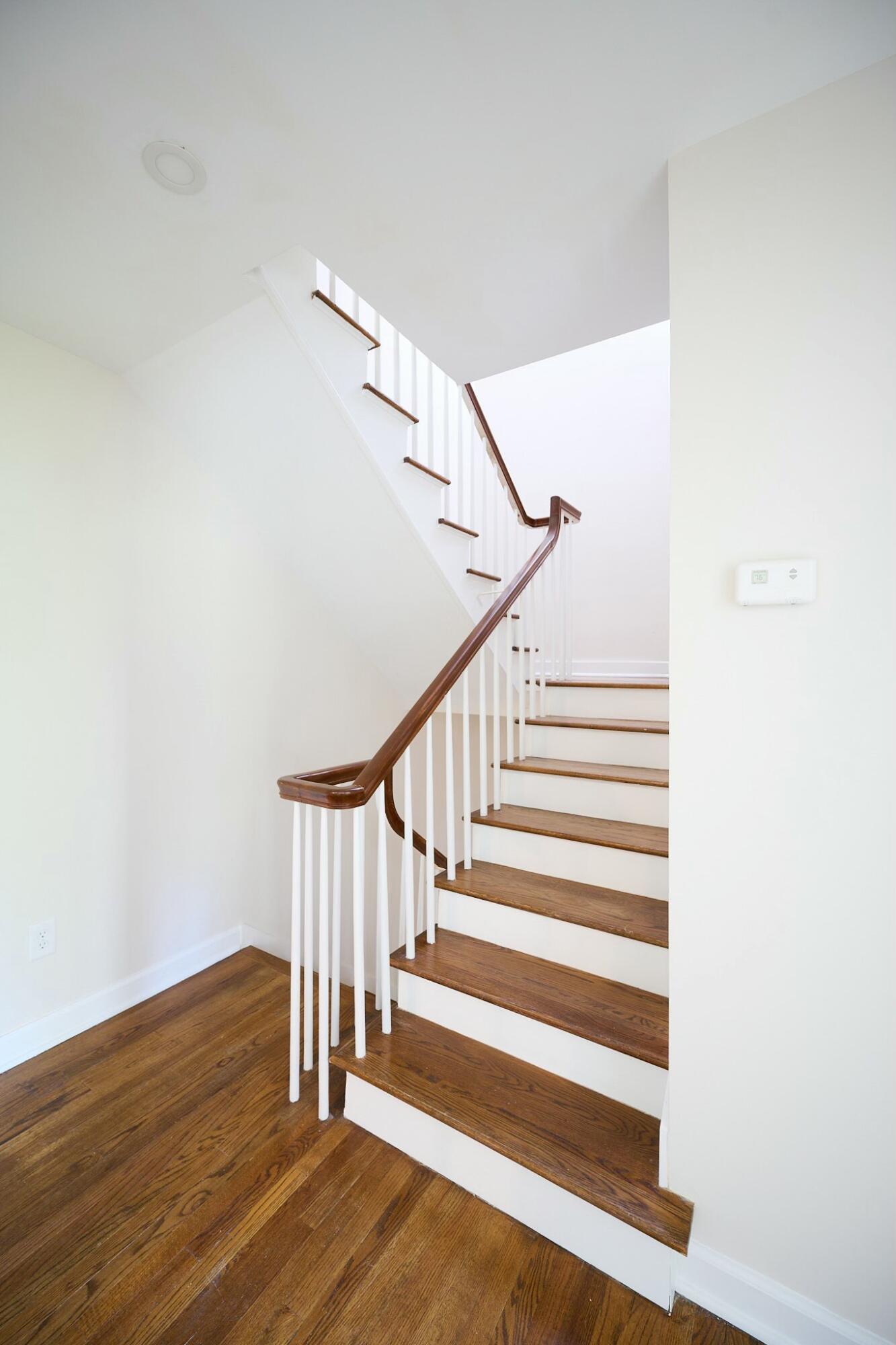 12 Elliott Street, Unit A Charleston, SC 29401 - Photo 39 of 56 Staircase to top floor