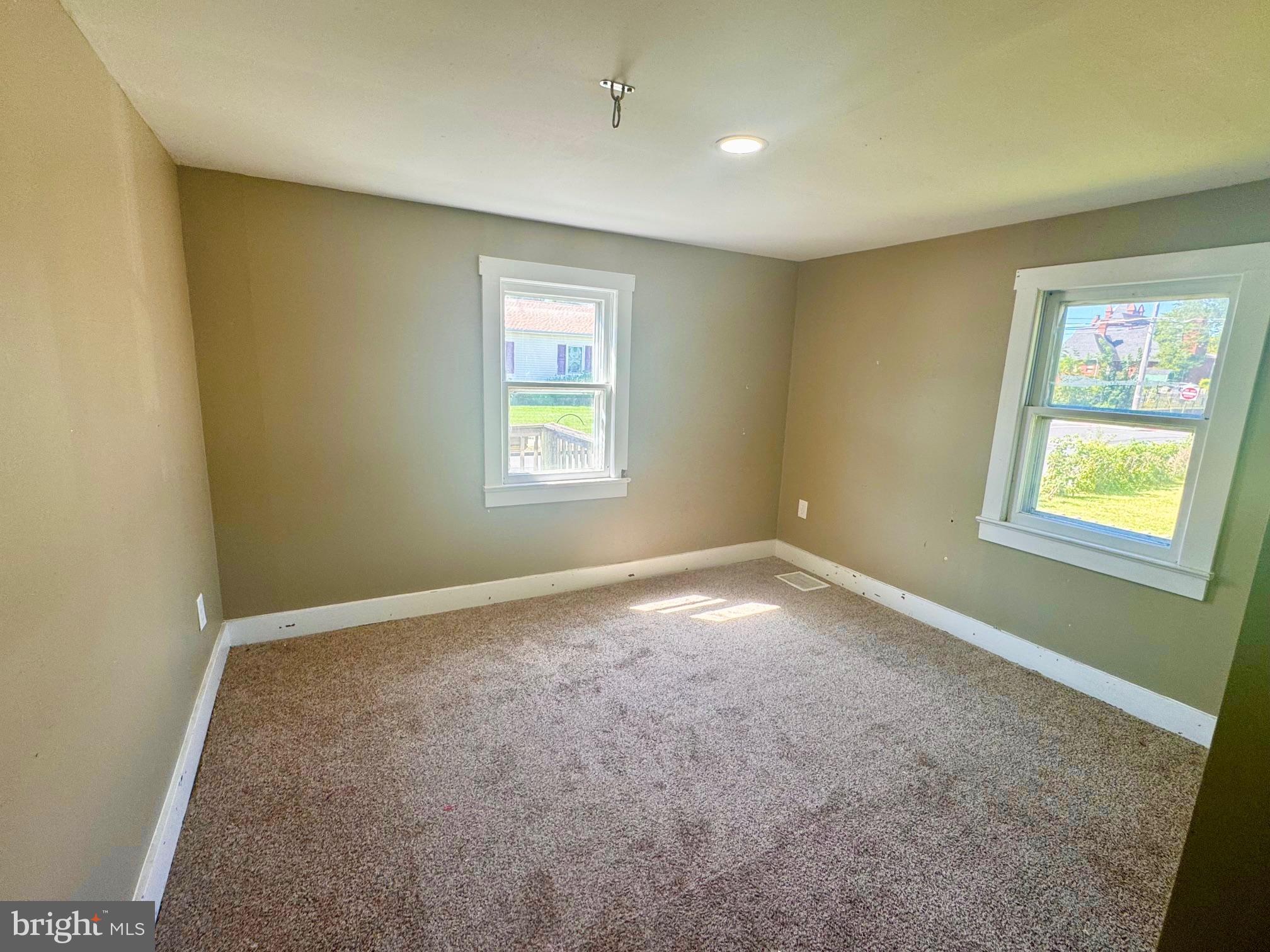 121 Jane Street Pemberton, NJ 08068 - Photo 11 of 21 an empty room with windows