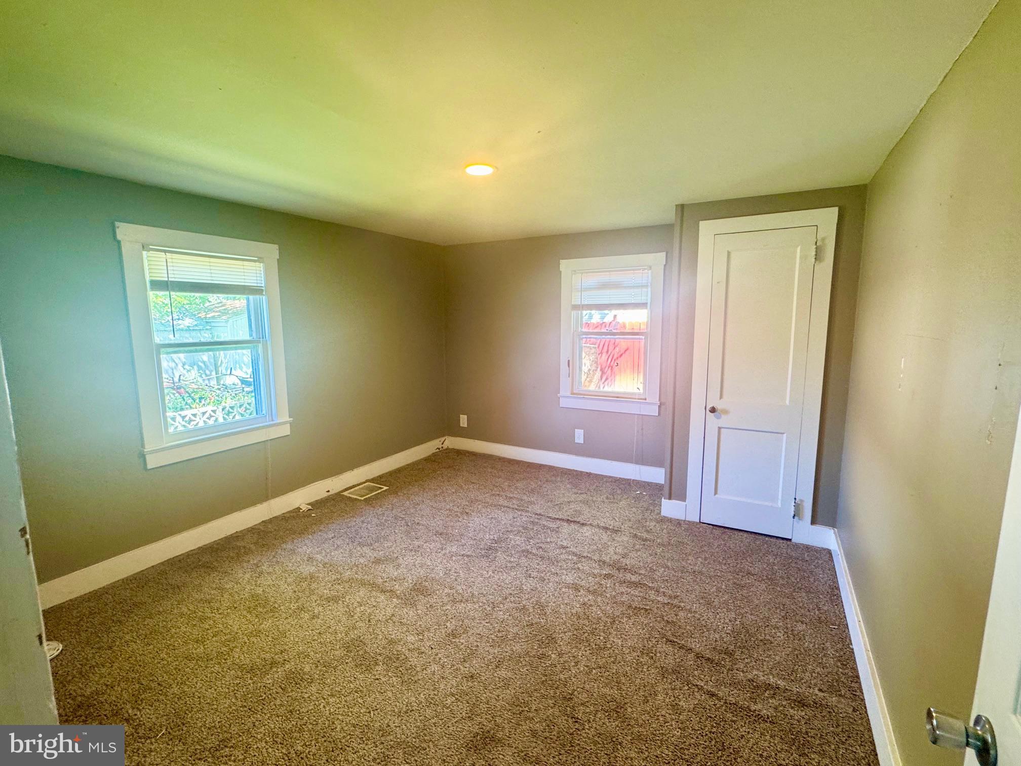121 Jane Street Pemberton, NJ 08068 - Photo 12 of 21 an empty room with windows