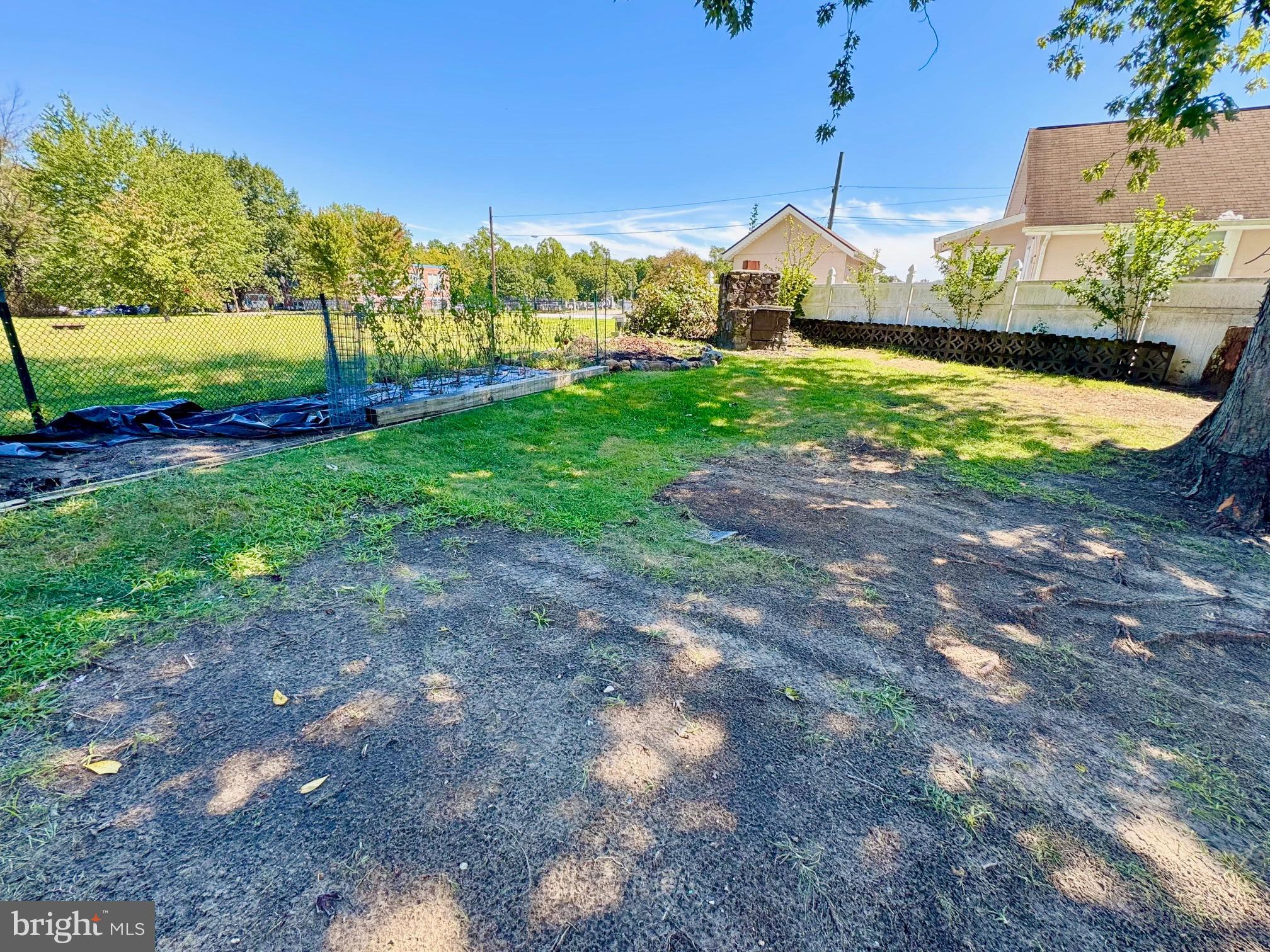 121 Jane Street Pemberton, NJ 08068 - Photo 3 of 21 a front view of a house with a yard and garage