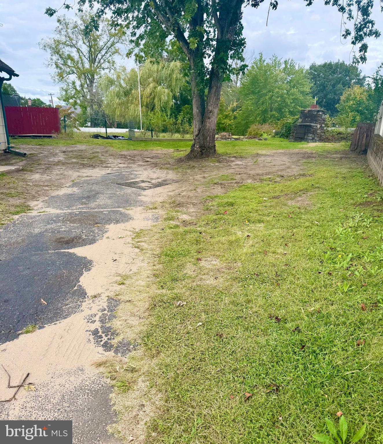 121 Jane Street Pemberton, NJ 08068 - Photo 4 of 21 a view of a yard with a tree
