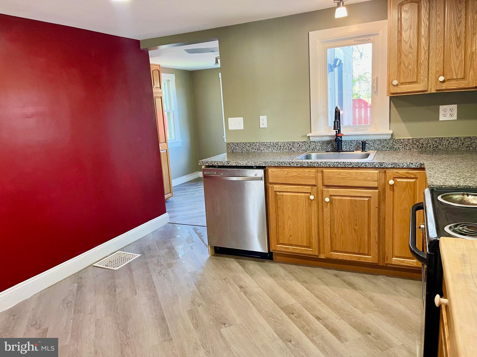 121 Jane Street Pemberton, NJ 08068 - Photo 5 of 21 a kitchen with stainless steel appliances granite countertop a granite counter tops and a window