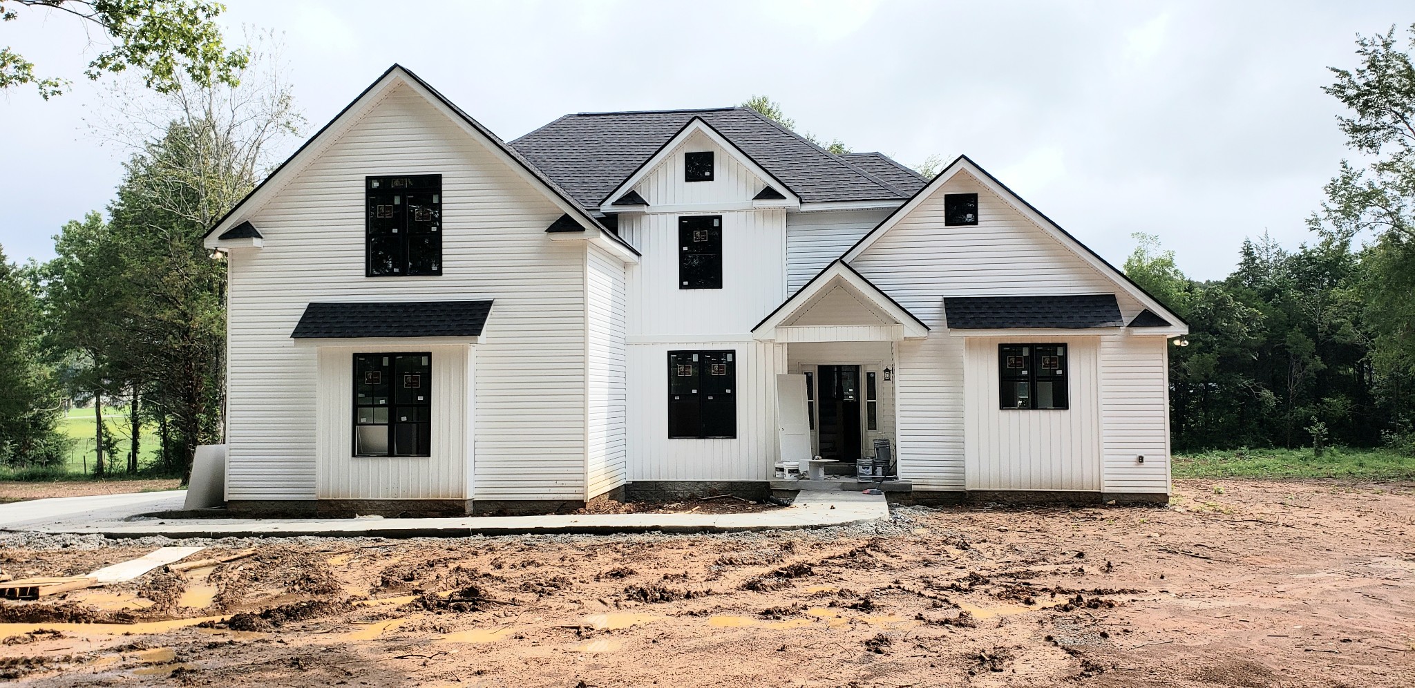 1140 Commerce Church Road Watertown, TN 37184 - Photo 1 of 21 a front view of a house with a yard